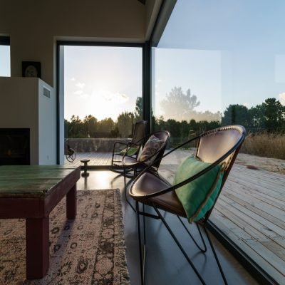 Modern house with garden swimming pool and wooden deck
